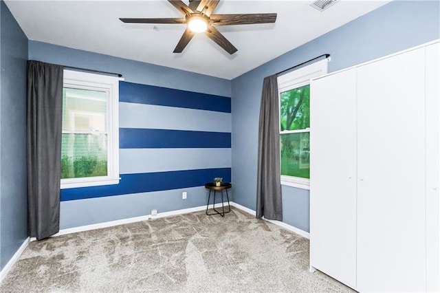 11424 W 67th Ter, Shawnee, KS 66203 - empty room with carpet, ceiling fan, and baseboards