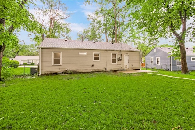 11424 W 67th Ter, Shawnee, KS 66203 - rear view of property with a patio