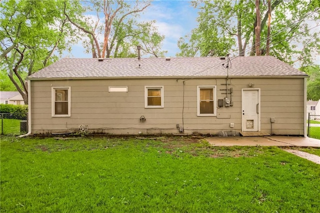 11424 W 67th Ter, Shawnee, KS 66203 - rear view of property featuring a patio and a shingled roof
