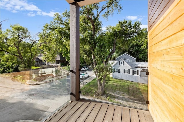 4550 Bell St, Kansas City, MO 64111 - deck with a patio area, a yard, and view of scattered trees