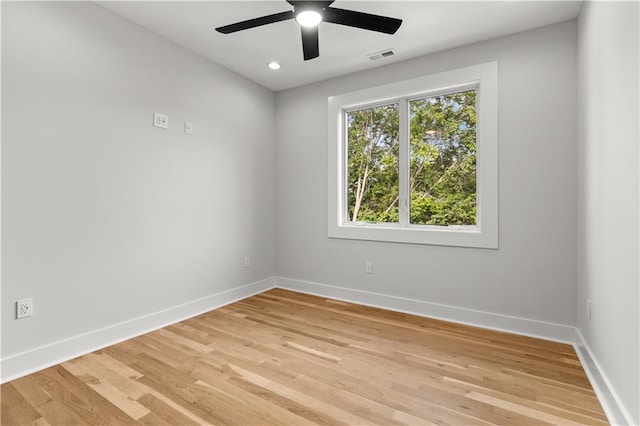 4550 Bell St, Kansas City, MO 64111 - empty room featuring light wood-style floors, ceiling fan, and recessed lighting