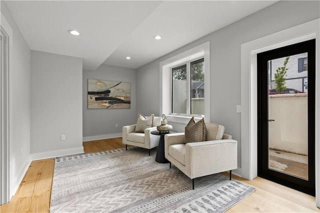 4550 Bell St, Kansas City, MO 64111 - sitting room featuring light wood-style floors and recessed lighting