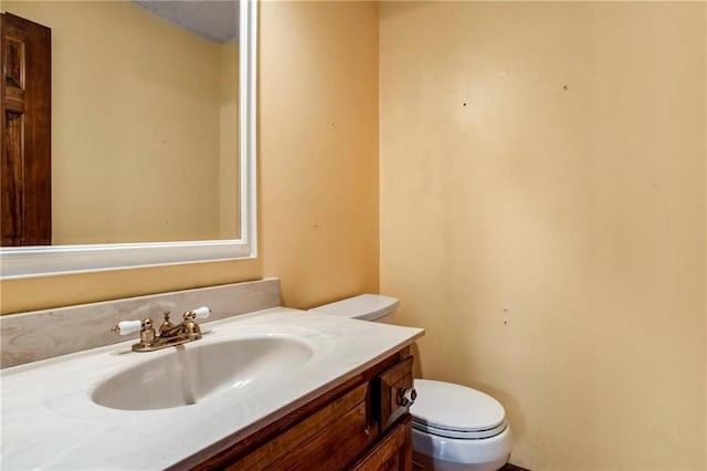 10404 Flint St, Overland Park, KS 66214 - bathroom with toilet and vanity