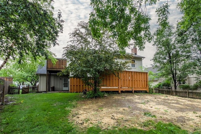 10404 Flint St, Overland Park, KS 66214 - view of yard featuring a deck