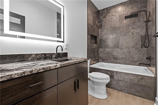4544 Bell St, Kansas City, MO 64111 - bathroom with vanity and tiled shower / bath combo
