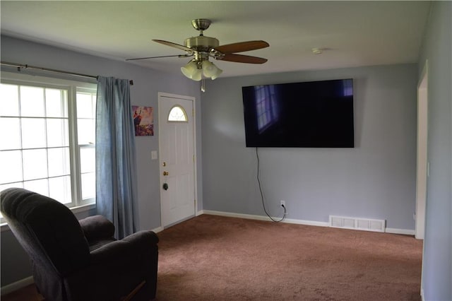 7141 SW F Hwy, Trimble, MO 64492 - carpeted living area with baseboards and a ceiling fan
