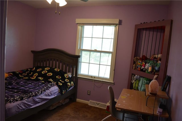 7141 SW F Hwy, Trimble, MO 64492 - carpeted bedroom featuring multiple windows and baseboards