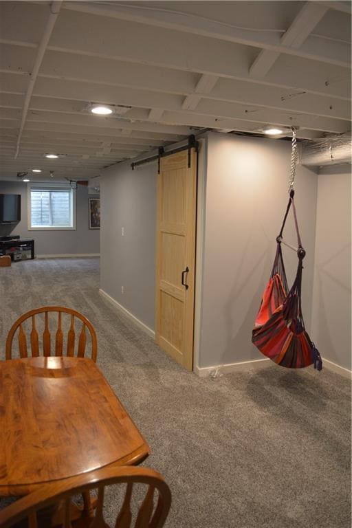 7141 SW F Hwy, Trimble, MO 64492 - recreation room with carpet, a barn door, baseboards, and recessed lighting