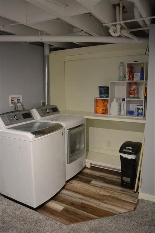 7141 SW F Hwy, Trimble, MO 64492 - washroom featuring independent washer and dryer and wood finished floors