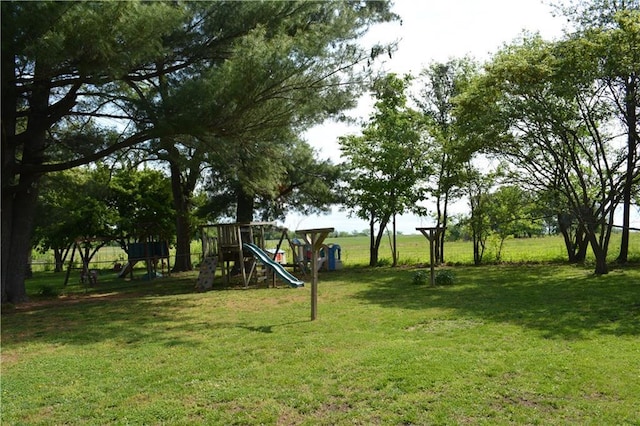 7141 SW F Hwy, Trimble, MO 64492 - view of green lawn with a playground
