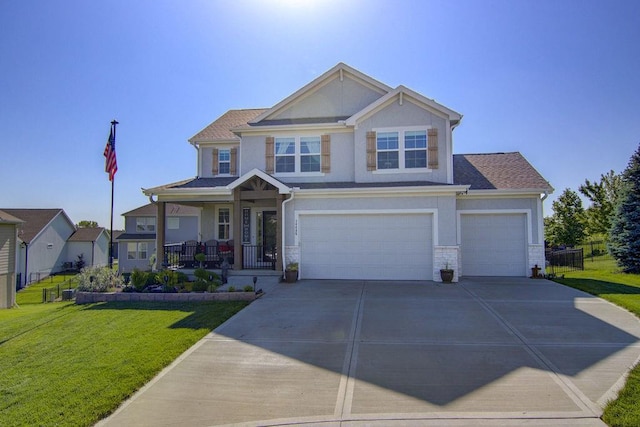 14485 S Houston St, Olathe, KS 66061 - craftsman-style house featuring a porch, a front yard, an attached garage, concrete driveway, and stone siding