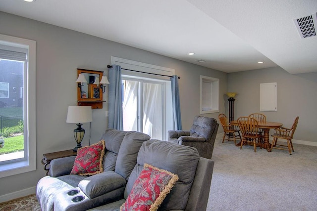 14485 S Houston St, Olathe, KS 66061 - living room featuring healthy amount of natural light, baseboards, recessed lighting, and light carpet