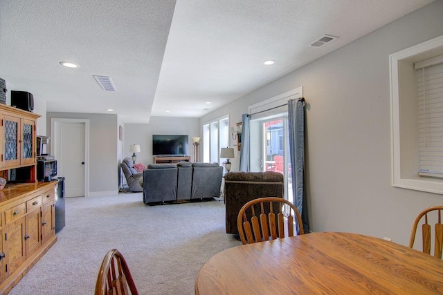 14485 S Houston St, Olathe, KS 66061 - dining area featuring light colored carpet, recessed lighting, and a textured ceiling