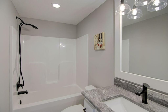14485 S Houston St, Olathe, KS 66061 - bathroom featuring vanity, shower / bathtub combination, toilet, and recessed lighting