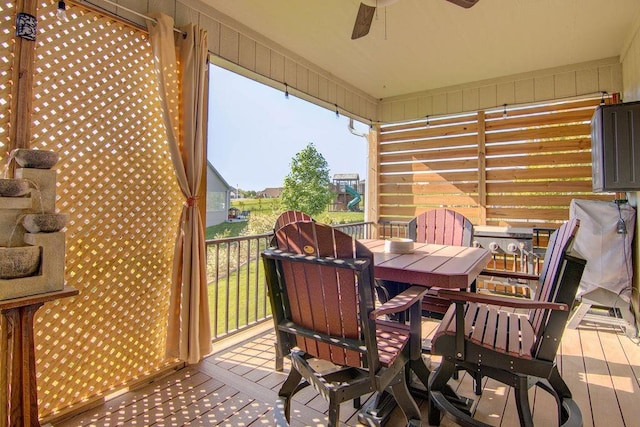 14485 S Houston St, Olathe, KS 66061 - wooden deck with a ceiling fan and outdoor dining space