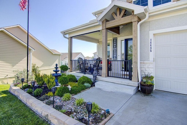 14485 S Houston St, Olathe, KS 66061 - property entrance featuring covered porch, a garage, stucco siding, and stone siding