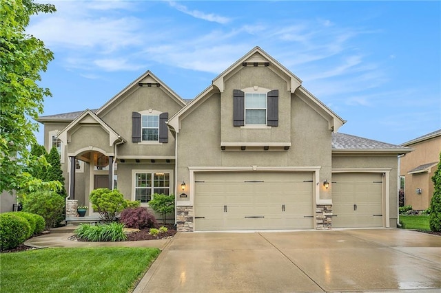 10601 N Euclid Ave, Kansas City, MO 64155 - traditional-style house with stucco siding, concrete driveway, and stone siding