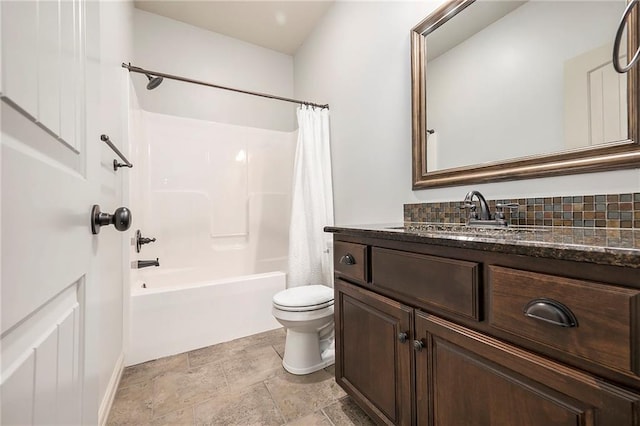 10601 N Euclid Ave, Kansas City, MO 64155 - bathroom featuring toilet, vanity, shower / bath combination with curtain, stone finish floors, and backsplash