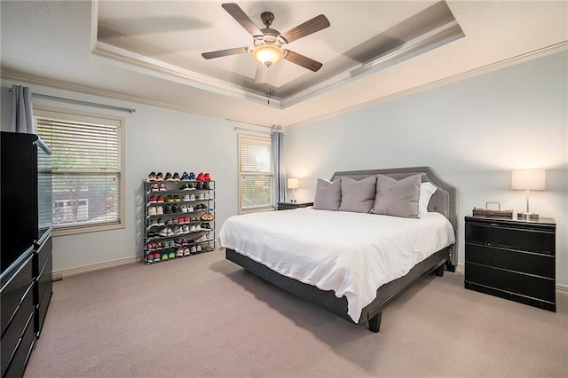 10601 N Euclid Ave, Kansas City, MO 64155 - carpeted bedroom with a raised ceiling, ornamental molding, a ceiling fan, and baseboards