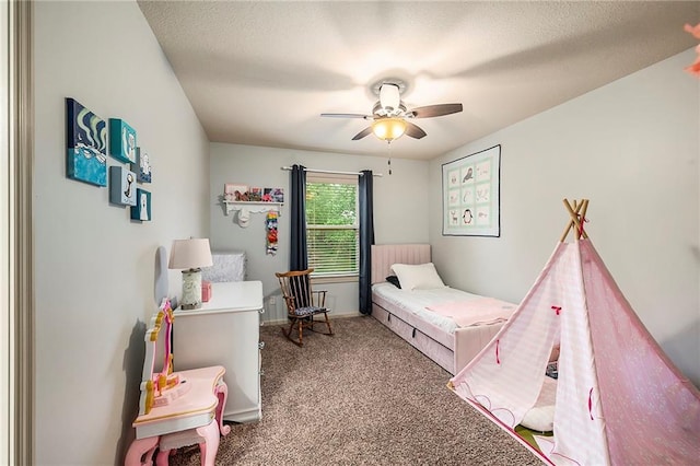 10601 N Euclid Ave, Kansas City, MO 64155 - bedroom with carpet, a ceiling fan, and baseboards