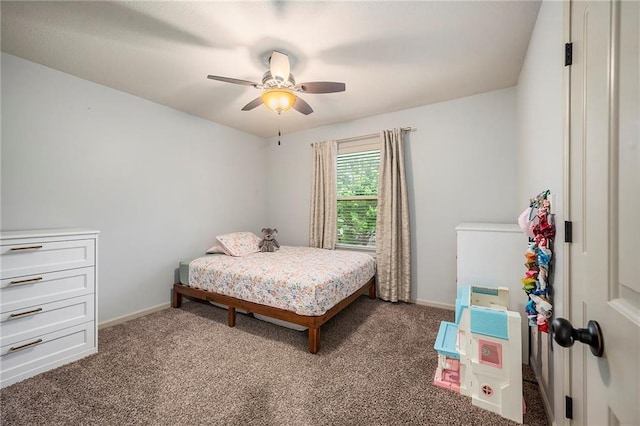 10601 N Euclid Ave, Kansas City, MO 64155 - bedroom featuring carpet, baseboards, and a ceiling fan