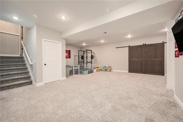 10601 N Euclid Ave, Kansas City, MO 64155 - game room with carpet floors, a barn door, baseboards, and recessed lighting