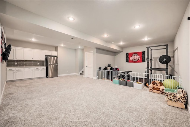 10601 N Euclid Ave, Kansas City, MO 64155 - workout area featuring baseboards, recessed lighting, and light colored carpet