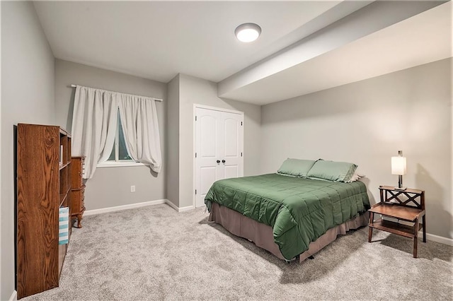 10601 N Euclid Ave, Kansas City, MO 64155 - carpeted bedroom with baseboards and a closet