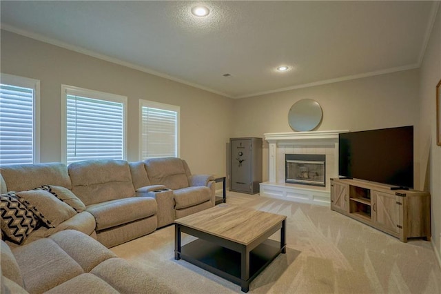 7500 N Oakland Ave, Kansas City, MO 64158 - living room with ornamental molding, a fireplace, light colored carpet, and recessed lighting
