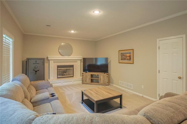 7500 N Oakland Ave, Kansas City, MO 64158 - carpeted living room featuring baseboards, crown molding, a fireplace, and recessed lighting