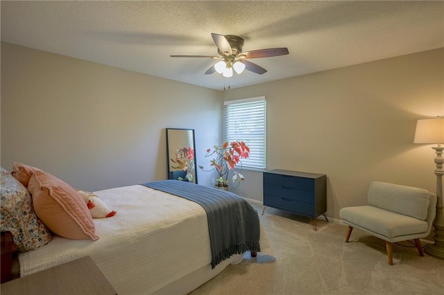 7500 N Oakland Ave, Kansas City, MO 64158 - bedroom featuring light colored carpet, ceiling fan, and baseboards