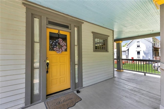 228 S Elm St, Ottawa, KS 66067 - doorway to property with covered porch