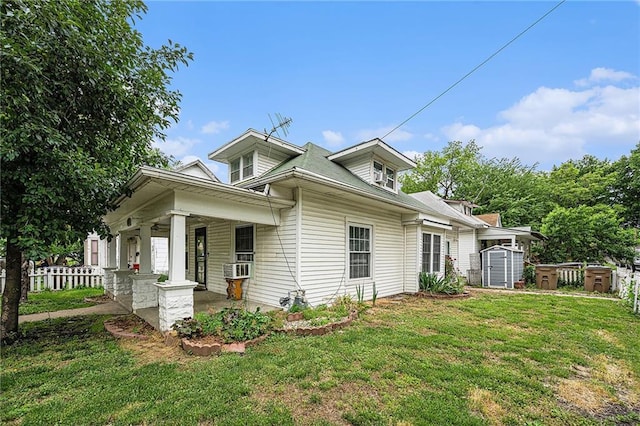 614 S 7th St, Atchison, KS 66002 - view of side of home featuring covered porch
