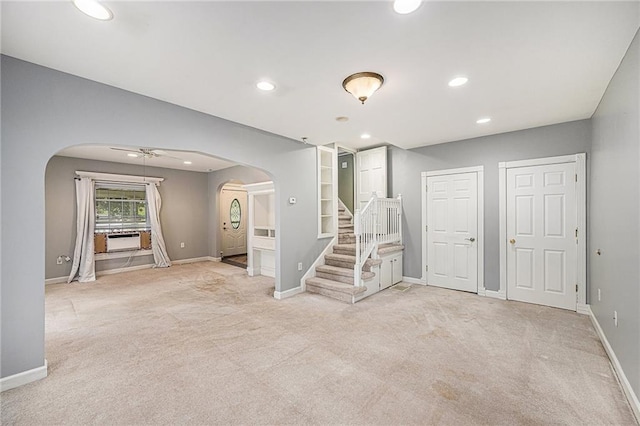614 S 7th St, Atchison, KS 66002 - entryway with arched walkways, carpet floors, baseboards, and recessed lighting