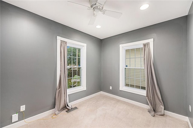 614 S 7th St, Atchison, KS 66002 - empty room featuring baseboards, ceiling fan, light colored carpet, and recessed lighting