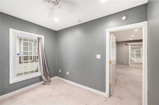614 S 7th St, Atchison, KS 66002 - unfurnished room featuring light carpet, baseboards, ceiling fan, recessed lighting, and a smoke detector