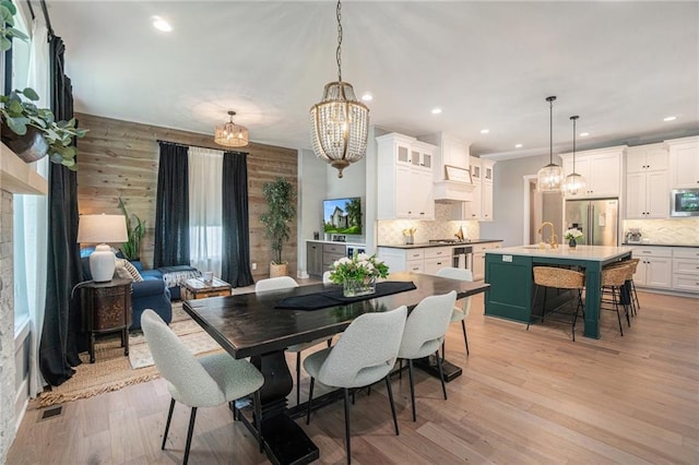 4112 W 156th St, Overland Park, KS 66224 - dining room with a chandelier, recessed lighting, and light wood-style flooring