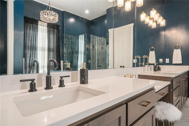 4112 W 156th St, Overland Park, KS 66224 - bathroom featuring a chandelier, double vanity, and a shower stall