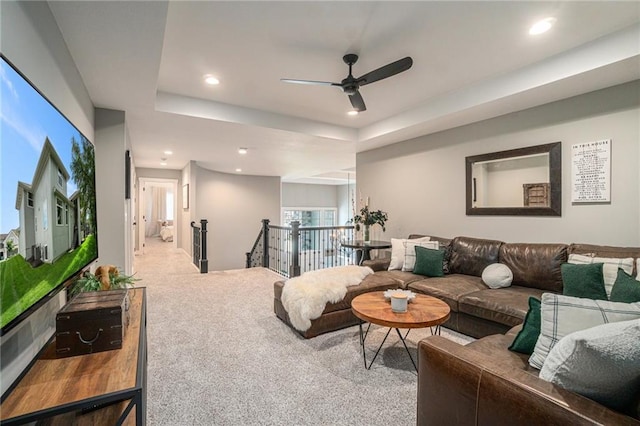 4112 W 156th St, Overland Park, KS 66224 - carpeted living area with a ceiling fan, recessed lighting, and a tray ceiling