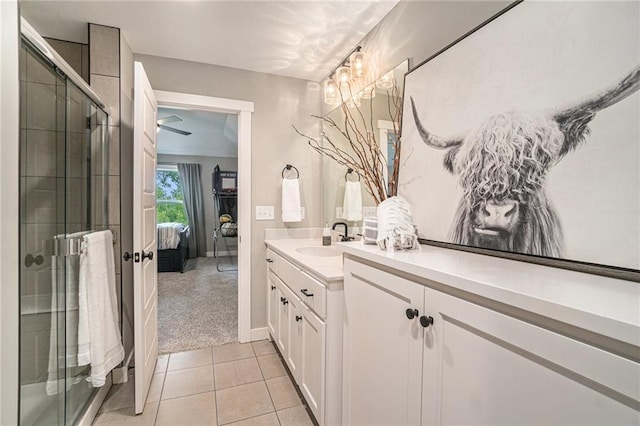 4112 W 156th St, Overland Park, KS 66224 - full bathroom with ensuite bathroom, vanity, a shower stall, and tile patterned flooring