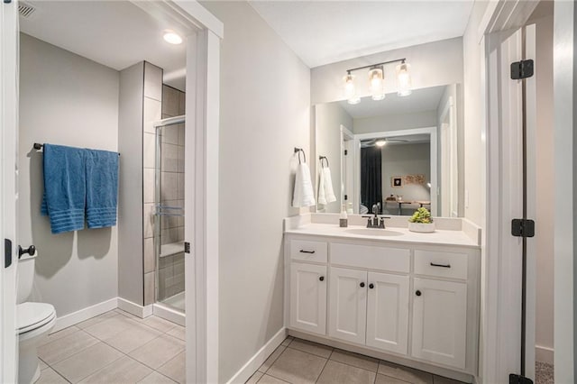 4112 W 156th St, Overland Park, KS 66224 - full bathroom with tile patterned flooring, vanity, baseboards, and a stall shower