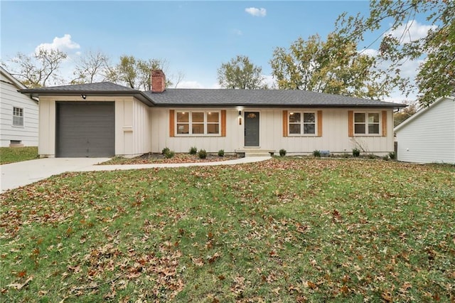 618 E 108th Ter, Kansas City, MO 64131 - ranch-style house with board and batten siding, concrete driveway, a chimney, an attached garage, and a front yard