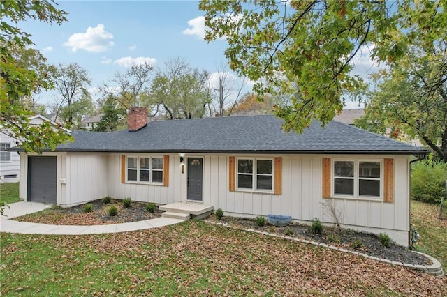 618 E 108th Ter, Kansas City, MO 64131 - ranch-style home with board and batten siding, a chimney, a garage, and a shingled roof