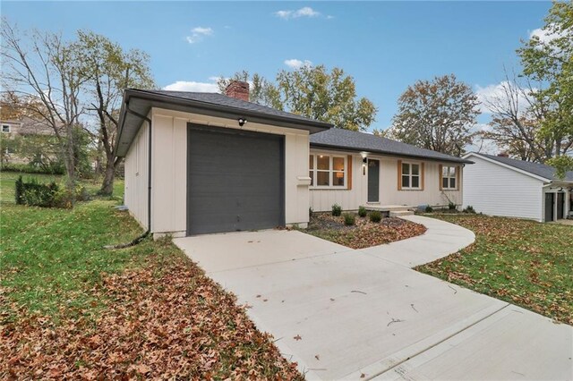 618 E 108th Ter, Kansas City, MO 64131 - single story home with a chimney, a garage, driveway, and a front yard