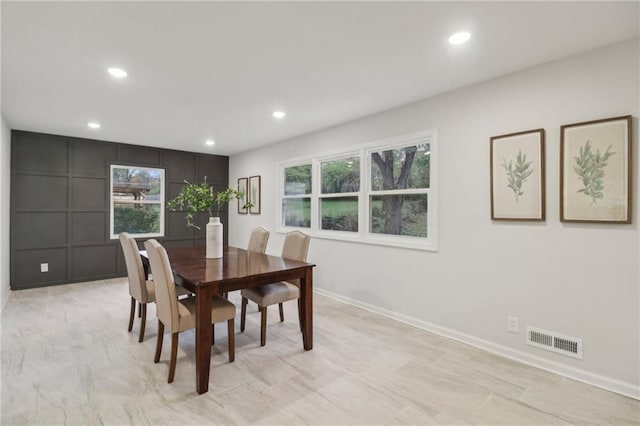 618 E 108th Ter, Kansas City, MO 64131 - dining room with recessed lighting and baseboards