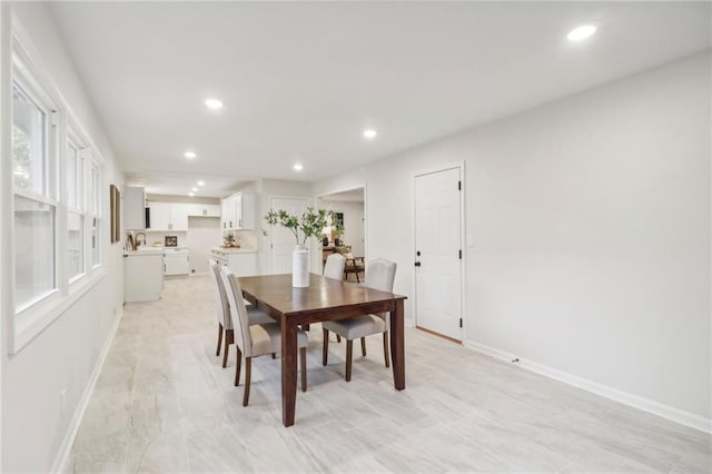 618 E 108th Ter, Kansas City, MO 64131 - dining room with baseboards and recessed lighting