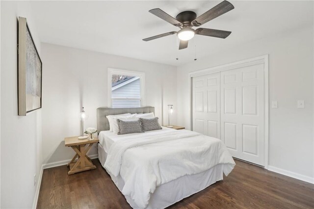 618 E 108th Ter, Kansas City, MO 64131 - bedroom with baseboards, a closet, wood finished floors, and ceiling fan