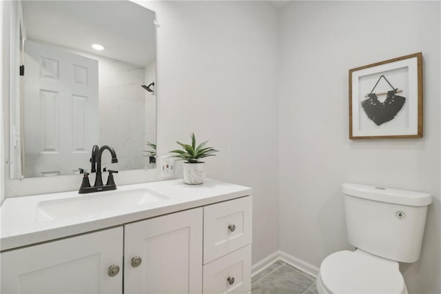 618 E 108th Ter, Kansas City, MO 64131 - bathroom featuring toilet, vanity, baseboards, and a shower