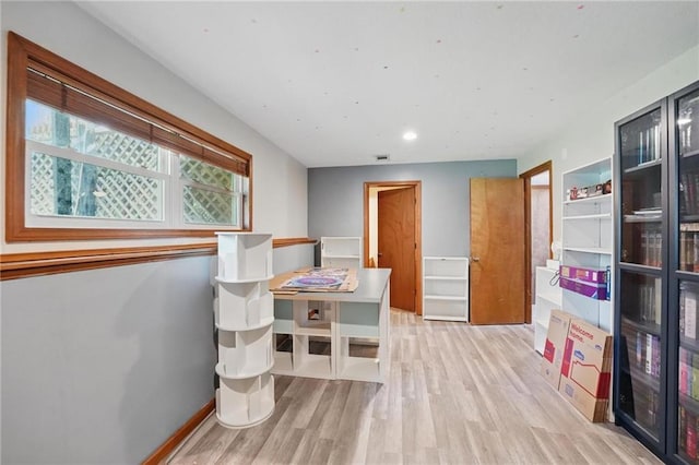 14713 W 149th Ct, Olathe, KS 66062 - rec room with wood finished floors and baseboards