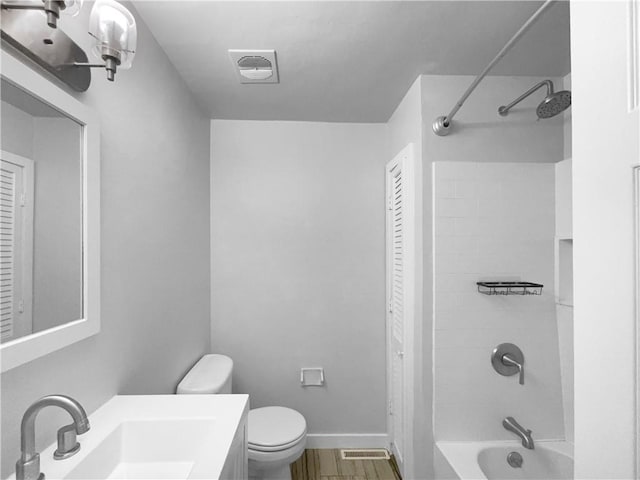 15405 E 40th St, Independence, MO 64055 - bathroom featuring toilet, shower / washtub combination, vanity, and baseboards